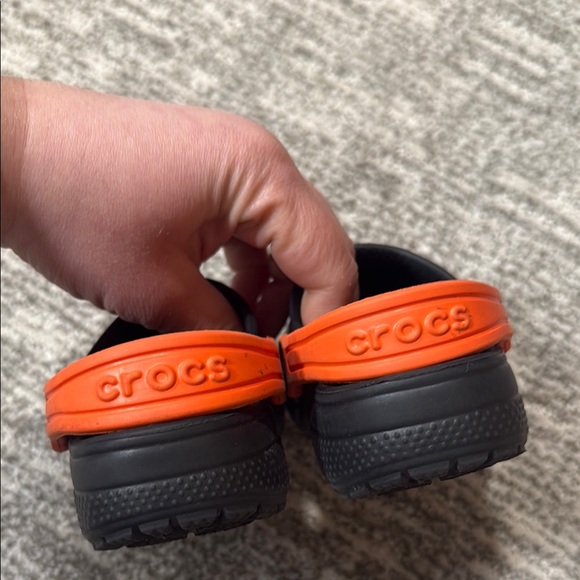 Crocs Kids' Black and Orange Space Clogs - Picture 3 of 6